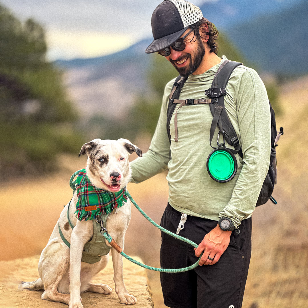 Kyle hiking with his dog